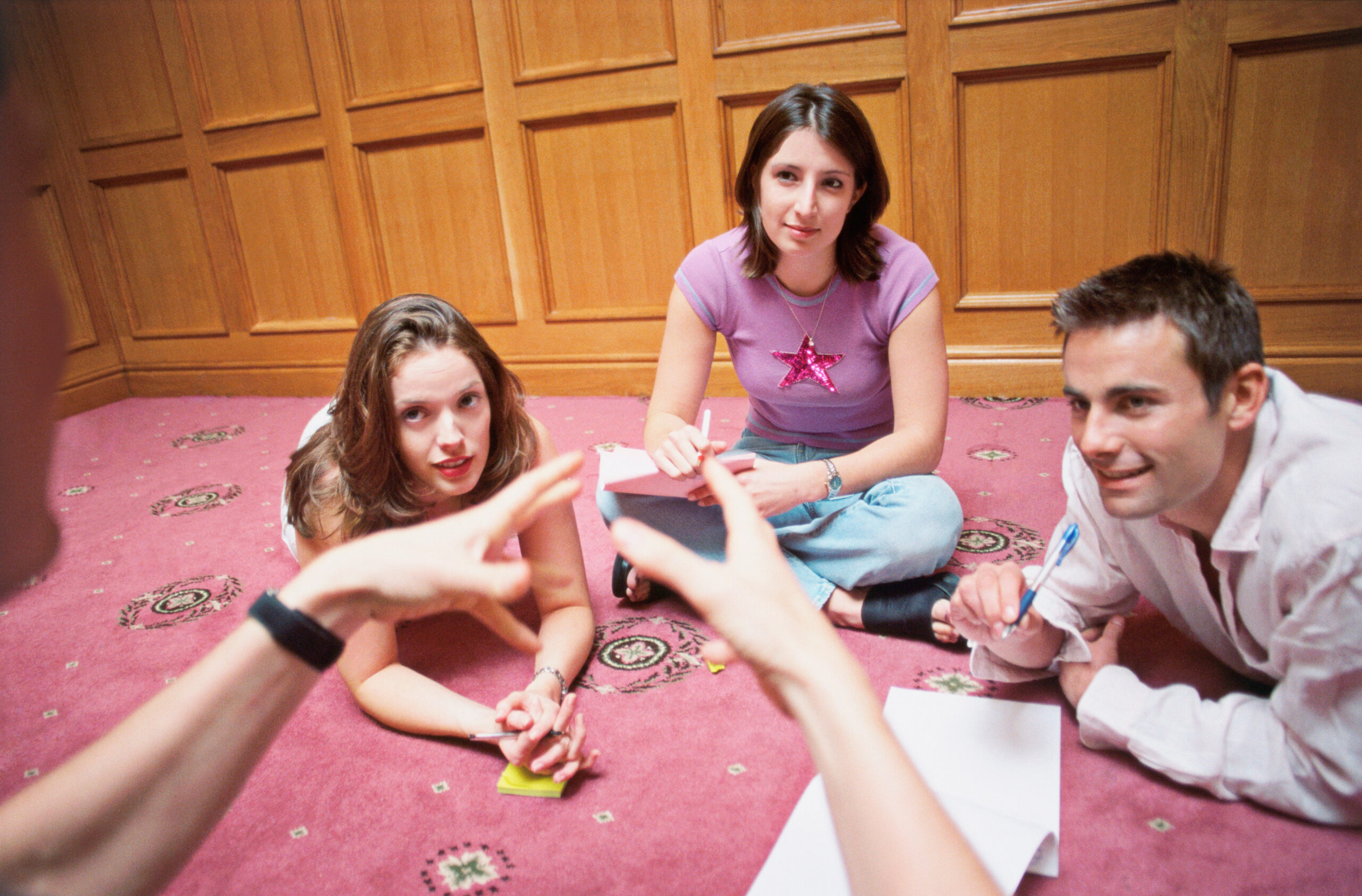 A group of students figuring out how to start a poker club.